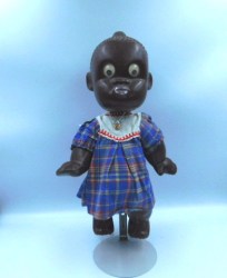14 INCH CIRCA 1948 LIGHT PLASTIC JOINTED BLACK DOLL, DRESS